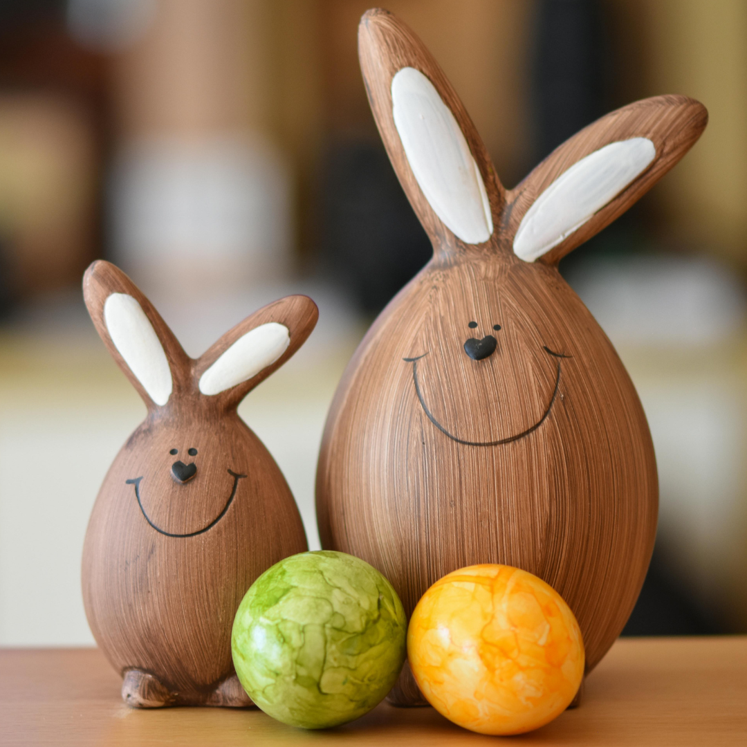 photo of two wooden bunnies