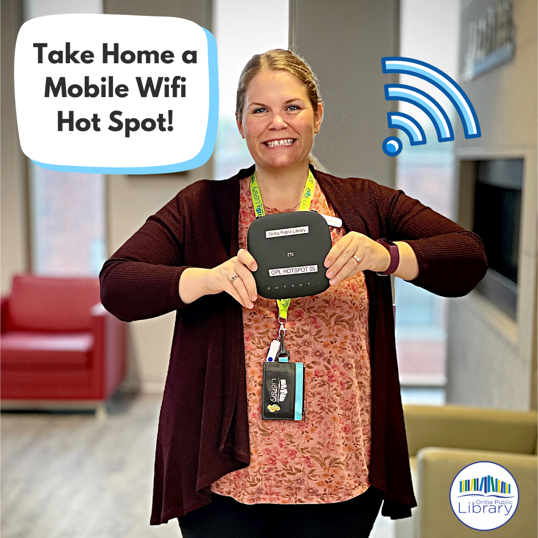 photo of woman holding a mobile hotspot