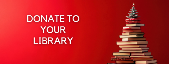 photo of a christmas tree made of books