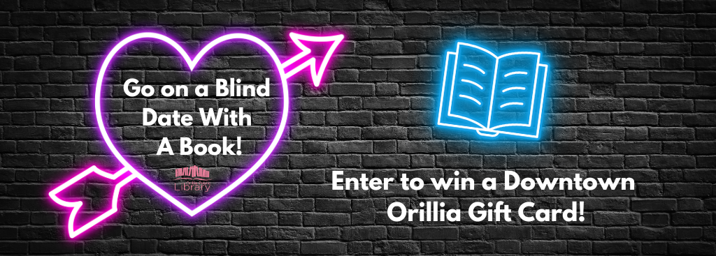 photo of a neon heart and book